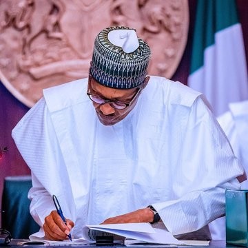  Buhari Signs 16 Constitutional Amendment Bills into Law