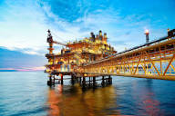 Chevron commitment to Venezuela beats profit estimate