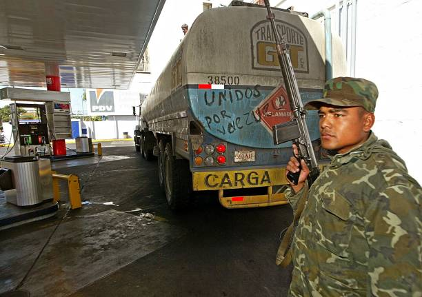 Despite U.S. blockage, oil tankers exit Venezuela under cover darkness