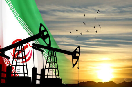 Silhouette of Oil pump on background of flag of Iran against the sunset or sunrise. Iran Oil Industry concept